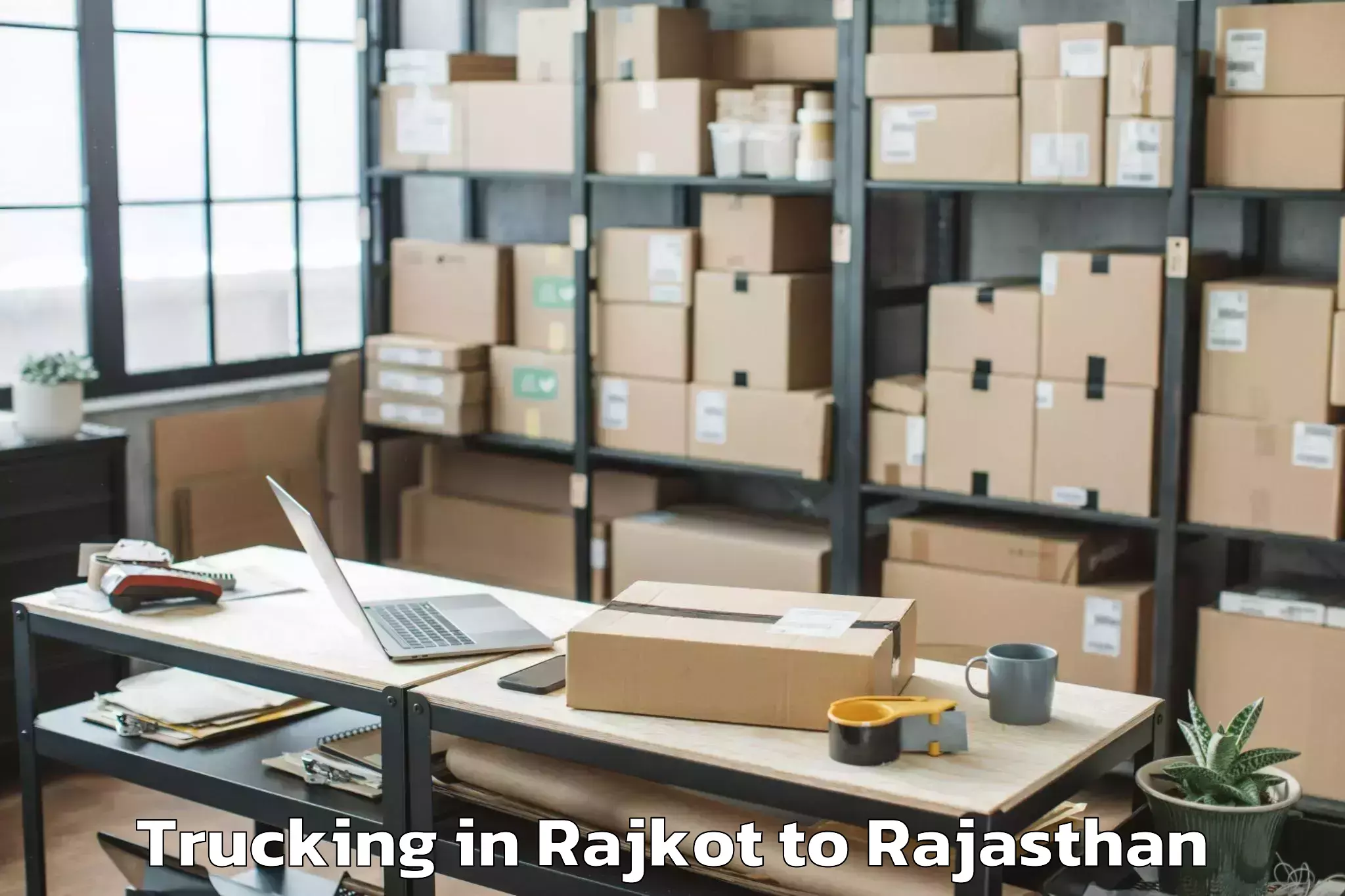 Professional Rajkot to Khairthal Trucking